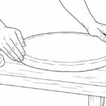 Dibujos de pames para colorear Manos alisando un comal de barro sobre una mesa